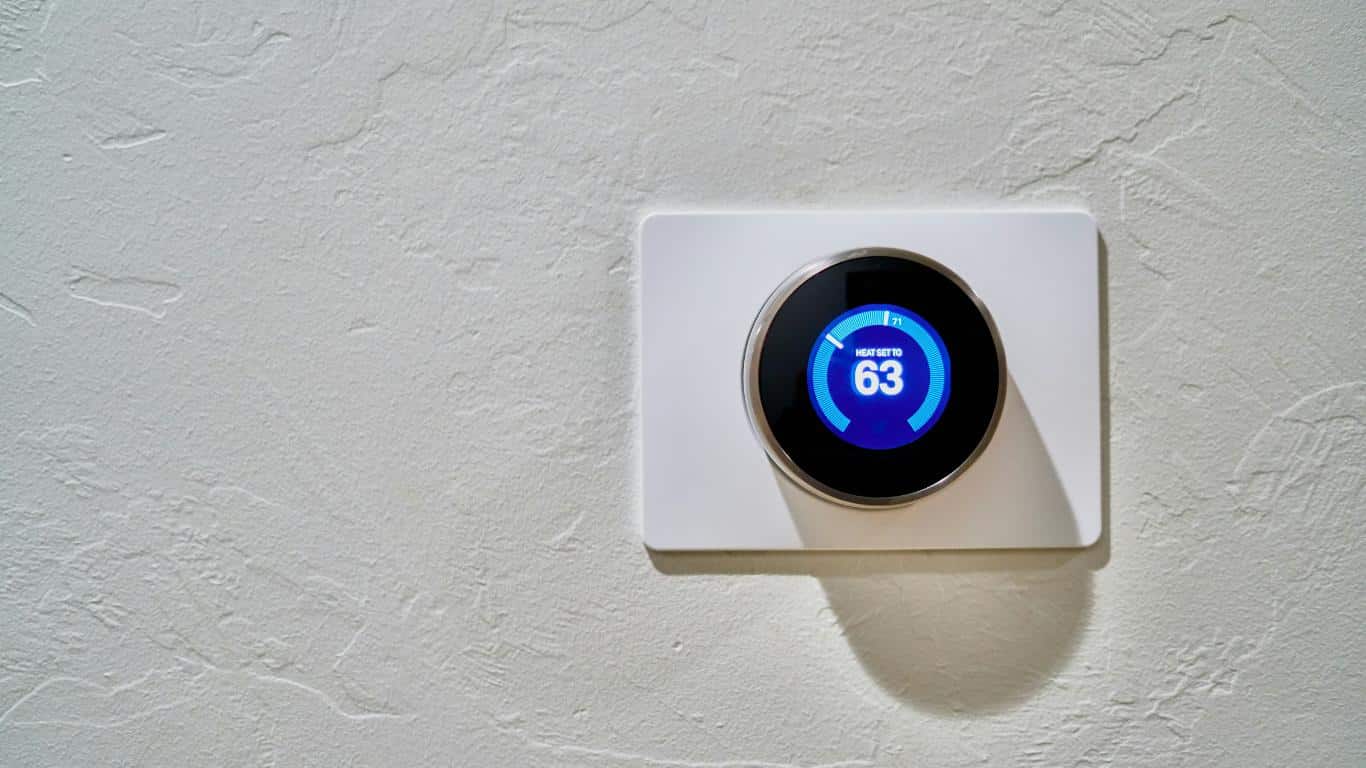 Smart Thermostat on blank wall